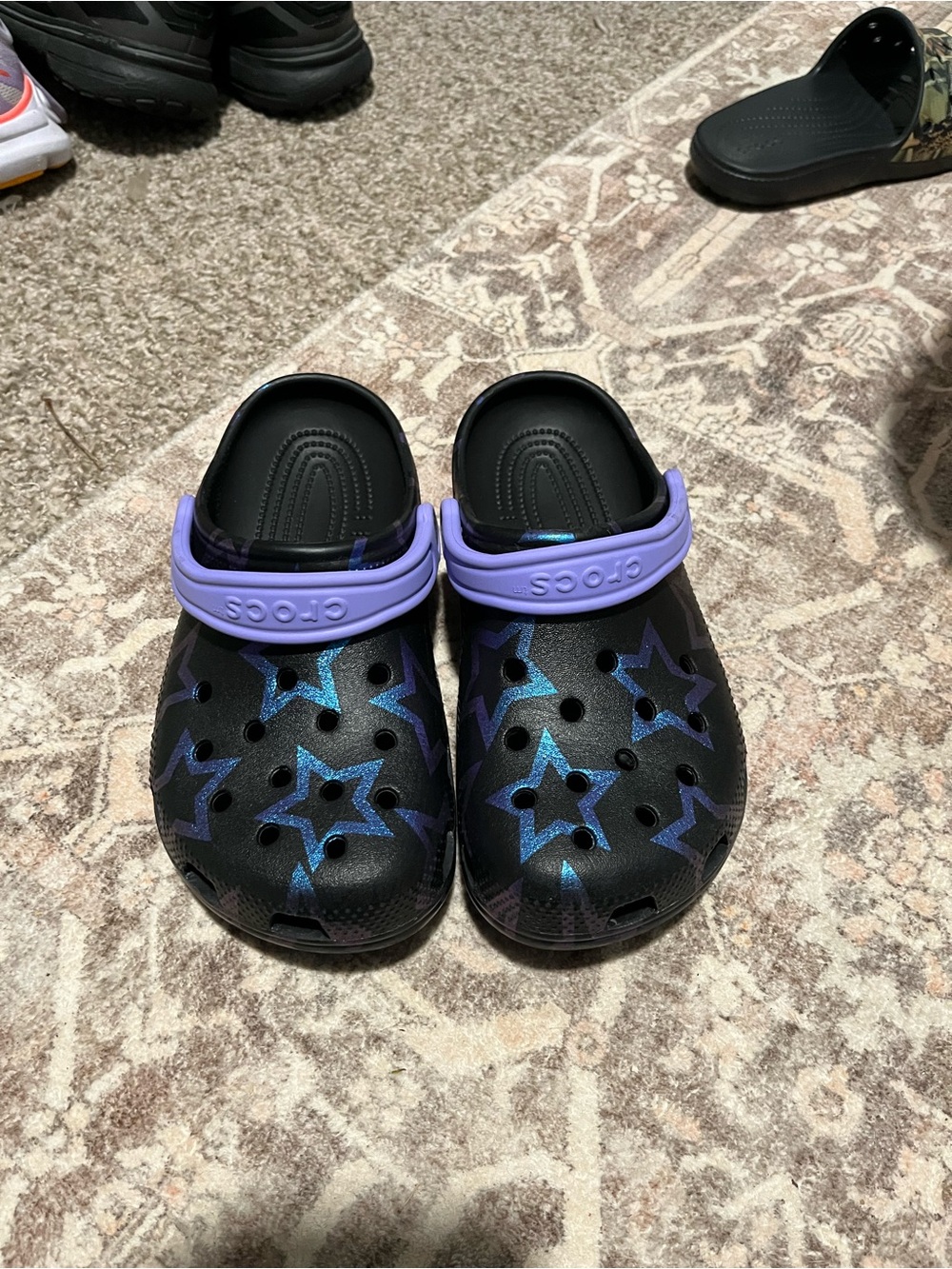 CROCS J6  Black Clog with Purple Strap and Blue-Purple Star Accents